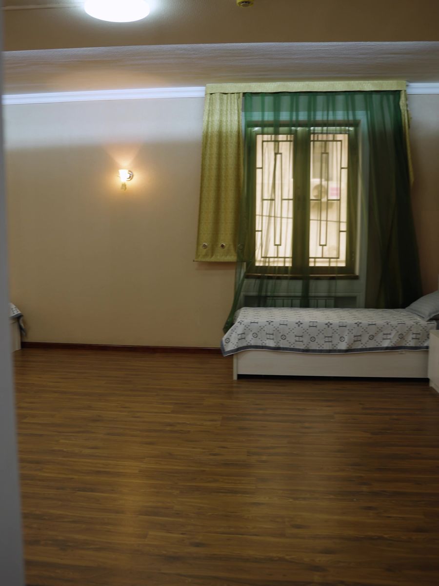 Комната с тремя кроватями
